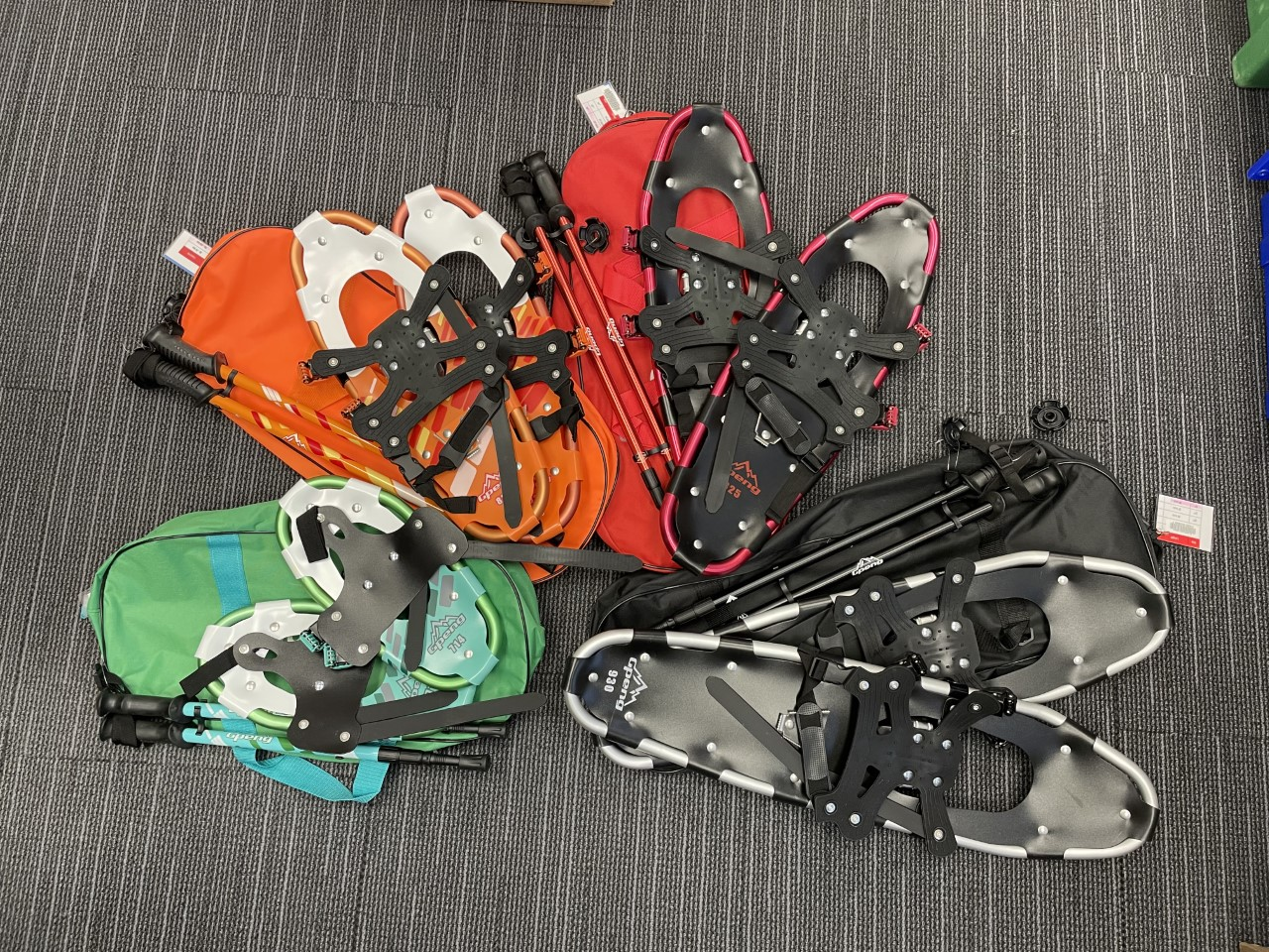 Snowshoes laid out on floor